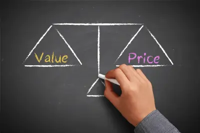 Chalkboard drawing of a balance comparing value and price